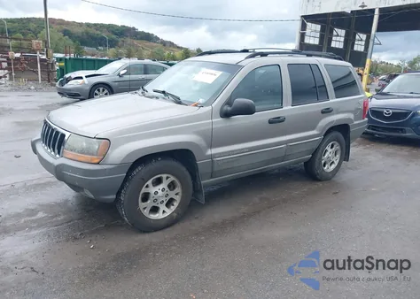 1999 Jeep Grand Cherokee Laredo из США, поврежденный, VIN 1J4GW58S1XC673530